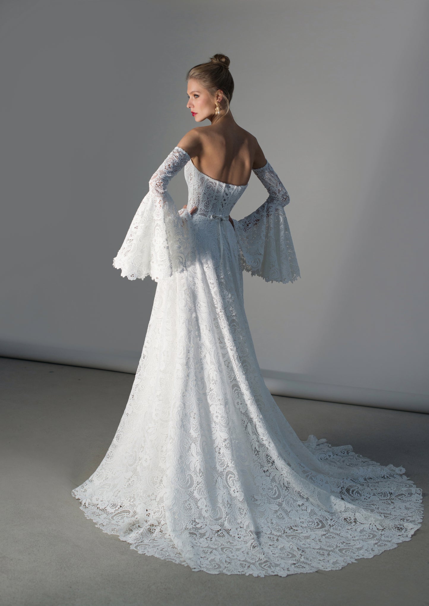 Unique Off-the-Shoulder Lace Wedding Dress with Bell Sleeves and Chapel Train - Tucana