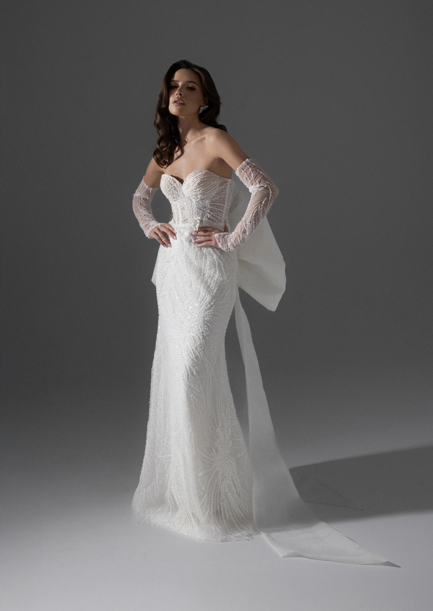 Glamorous Strapless Straight Wedding Dress with Sleeves and Oversized Bow Train - Caren