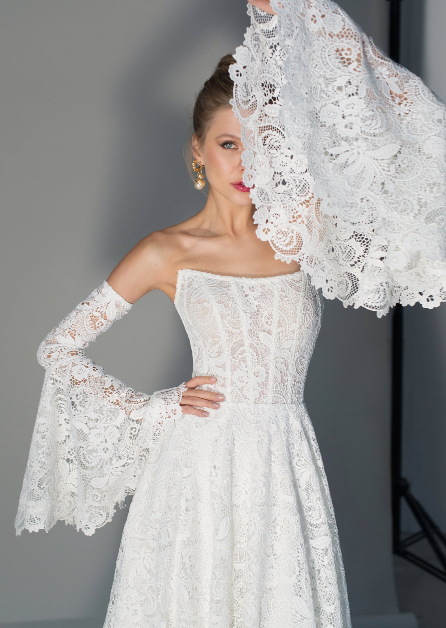 Unique Off-the-Shoulder Lace Wedding Dress with Bell Sleeves and Chapel Train - Tucana