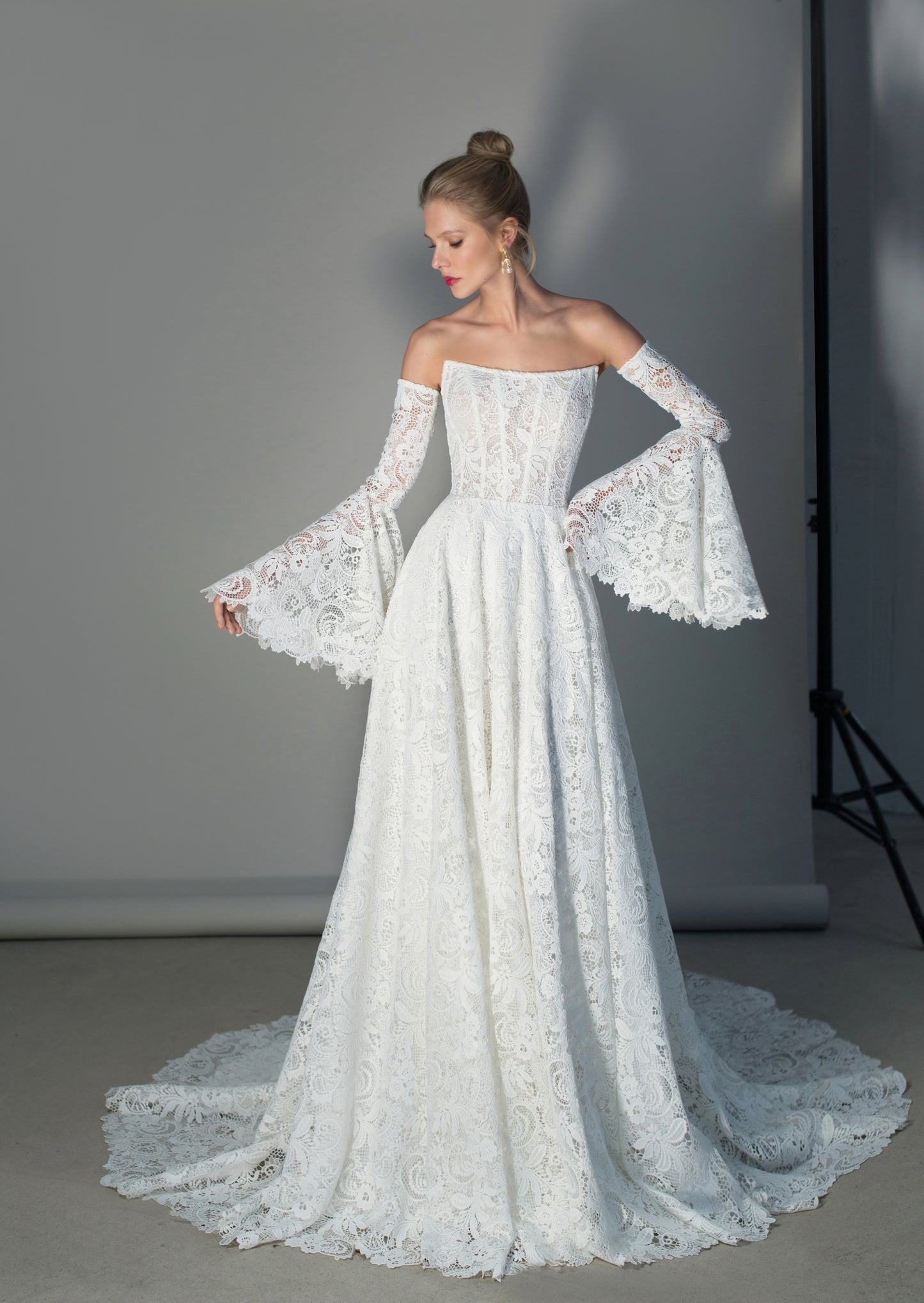 Unique Off-the-Shoulder Lace Wedding Dress with Bell Sleeves and Chapel Train - Tucana