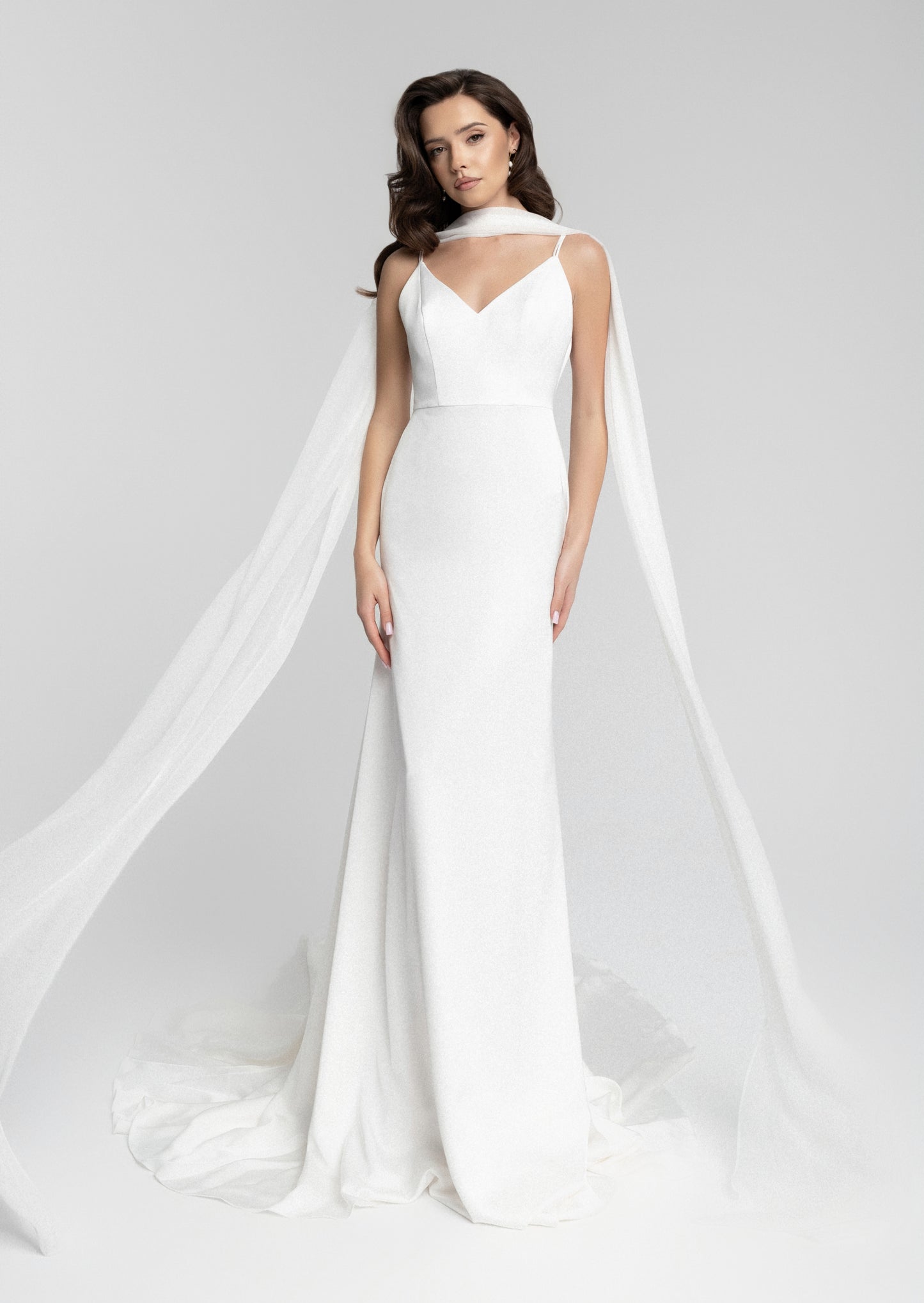 Chic Minimalist Bridal Gown with Flowy Scarf and Sleek Silhouette - Celerona