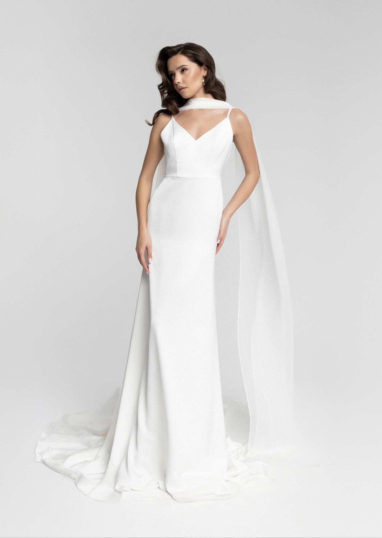 Chic Minimalist Bridal Gown with Flowy Scarf and Sleek Silhouette - Celerona